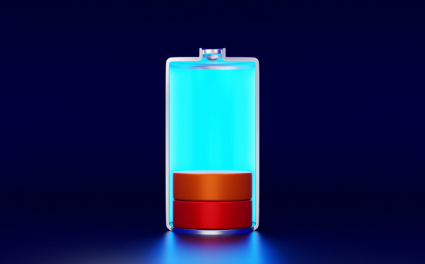 A dark blue background and light blue battery shape with 2 red and orange discs at the bottom indicating low battery; concept is exhaustion, chronic fatigue syndrome 